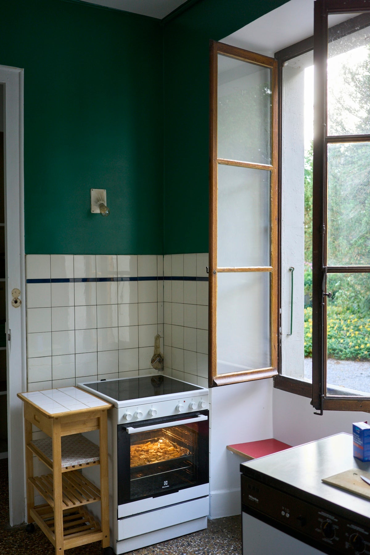 a kitchen with a sink and a window