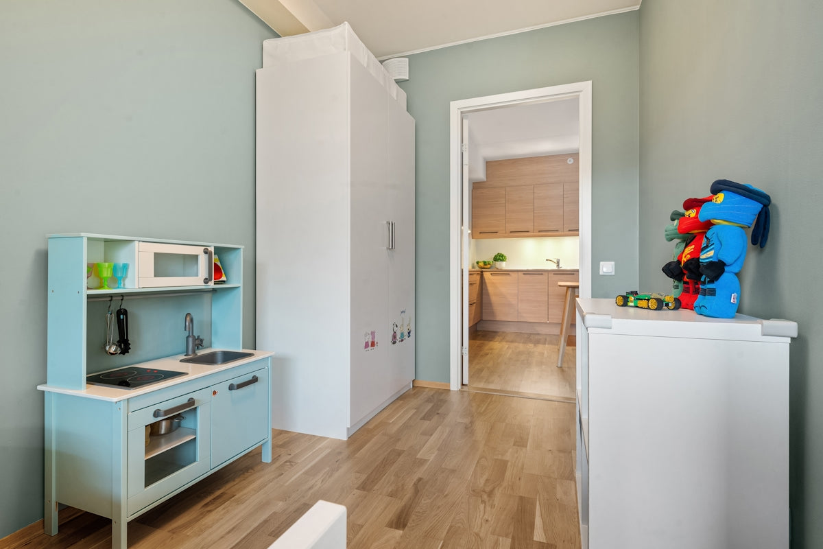 A kitchen with a stove top oven sitting inside of it
