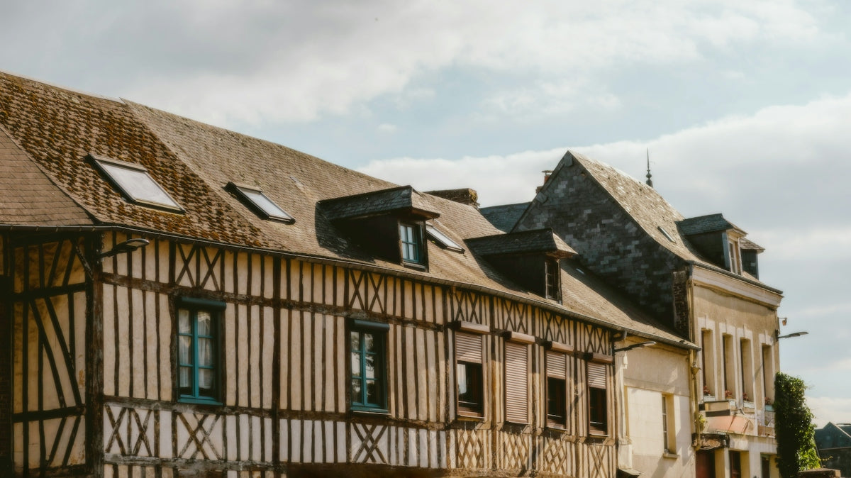 A row of old wooden buildings on a street