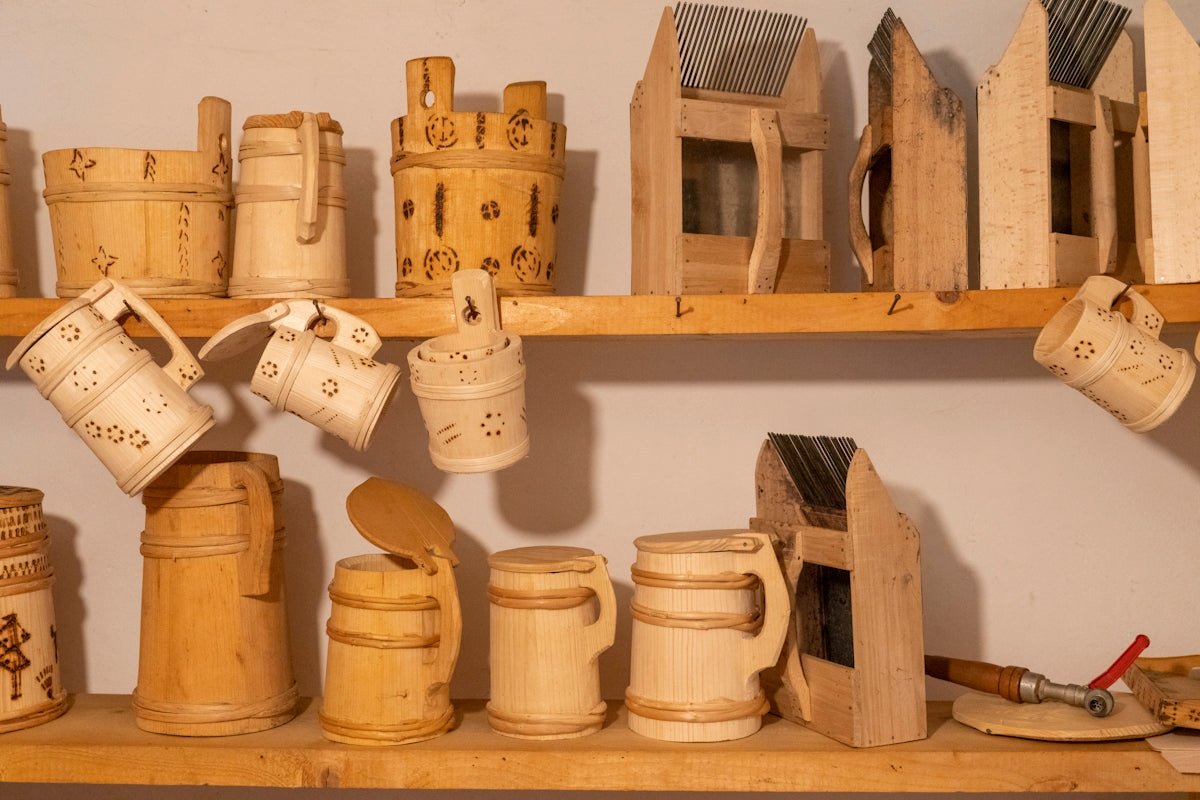 a shelf filled with lots of wooden objects