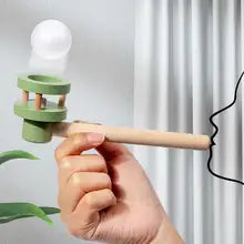 Jouet sensoriel en bois avec boule flottante