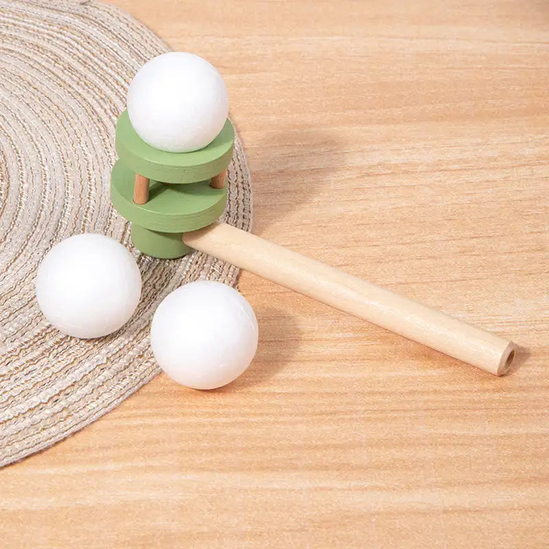Jouet sensoriel en bois avec boule flottante