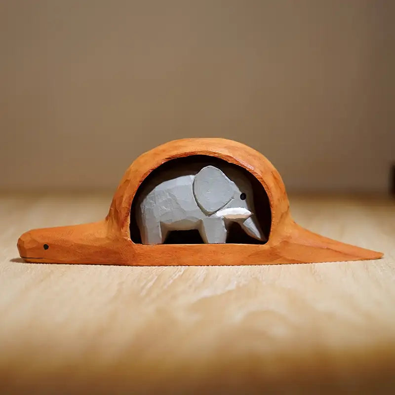 Serpent et éléphant en bois faits à la main